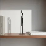 Together art designed by Architect Dimitris Zelios, offering a captivating fusion of elegance and contemporary design. These striking pieces feature intricate, minimalist profiles of faces, expertly crafted from high-quality metal to create a sense of depth and sophistication. The clean lines and fluid contours evoke a sense of emotion and personality, making each piece a unique focal point in any space. Perfect for those seeking to add a touch of modern artistry and individuality to their decor, these face profile sculptures elevate your environment with refined beauty.