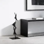 Enhance your space with the Fish Triangles, a contemporary sculptural piece that seamlessly blends minimalist design with artistic flair. Crafted from high-quality metal, this sculpture features a series of stylized fish forms arranged in a dynamic composition, embodying the fluidity and grace of marine life.