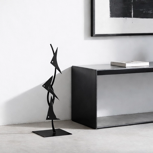 00031 decor Enhance your space with the Fish Triangles, a contemporary sculptural piece that seamlessly blends minimalist design with artistic flair. Crafted from high-quality metal, this sculpture features a series of stylized fish forms arranged in a dynamic composition, embodying the fluidity and grace of marine life.