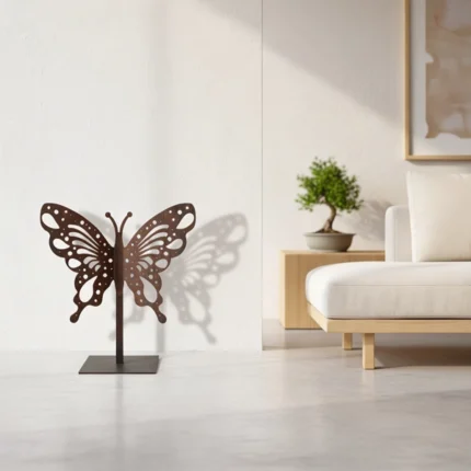 Butterfly on Steel a striking, large butterfly sculpted in metal, mounted on a square steel base. Its intricate design and sturdy structure make it an ideal addition to gardens, patios, or outdoor spaces. The bold presence of the butterfly, paired with its elegant form, creates a captivating focal point for any outdoor setting.