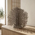 Coral a stunning metal sculpture inspired by the intricate beauty of coral, this piece brings a touch of the ocean into your space. Crafted with delicate detail and a sleek finish, it serves as a unique decorative element for both modern and coastal-inspired interiors. Ideal for adding texture and a natural aesthetic to any room or display.