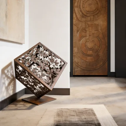 Introduce a harmonious blend of nature and geometry into your space with the Tree Branch Cube, a captivating creation by architect and designer Dimitris Zelios. This minimalist metal sculpture encapsulates the organic beauty of tree branches within the structured form of a cube, offering a contemporary piece that evokes both strength and serenity. Its versatile structure makes it a perfect addition to any space seeking artistic sophistication and a touch of nature-inspired tranquility.