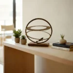 Aquarium a modern metal art piece inspired by underwater life, featuring abstract fish shapes arranged dynamically on a base. The clean lines and layered design evoke movement and serenity. Ideal for: Contemporary living rooms, offices, or spaces seeking a subtle aquatic touch.