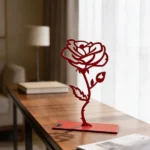 Rose a delicate metal sculpture of a rose, designed with simple, elegant lines. A timeless decorative piece that adds a romantic, artistic touch to any space.