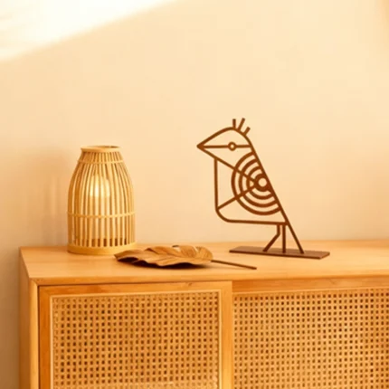 Geometric Tropical Bird Decorative Object A minimalist metal bird defined by clean lines and geometric form. Its abstract design brings a sense of balance and modern artistry to shelves, consoles, or desks, making it an elegant accent for contemporary interiors.