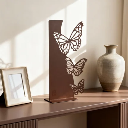 A delicate arrangement of metal butterflies in flight, this piece adds a sense of lightness and movement. The intricate detailing contrasts beautifully with the sleek metal finish. Ideal for: Bedrooms, living rooms, or spaces aiming to evoke freedom and beauty.