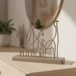 A sleek metal sculpture capturing the graceful form of a giraffe with minimalist lines and a modern aesthetic. Its gentle presence and artistic simplicity make it a charming addition to various interior styles. Ideal for: Contemporary interiors, office spaces, or kids’ rooms with a playful and stylish touch.