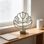 Leafs a sculptural metal leaf design by architect Dimitris Zelios, combining minimalist elegance with organic form. Τhis piece adds a touch of nature-inspired artistry to any modern interior.