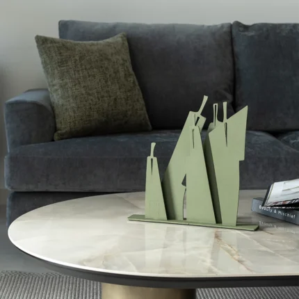 Family photo an abstract metal sculpture featuring simplified human figures standing closely together, posed as if ready to take a family photo. Its minimalist lines convey unity, presence, and shared moments with understated elegance. Ideal for: Family rooms, living areas, offices, or any space celebrating togetherness and memories.