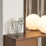 Minimalist metal cactus — a modern table decor piece available in four elegant finishes, perfect for adding an artistic touch to any space.