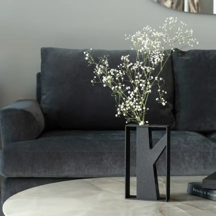 Tree Vase a sculptural metal vase inspired by the branching form of a tree, paired with a clear glass tube for holding a single stem or small arrangement. Combining organic design with industrial elegance, Tree Vase stands as a bold yet refined decorative piece. (glass tube vase included)