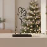 Virgin Mary, Christ & Joseph – DIZE Art Objects. A minimalist metal sculpture that captures the Holy Family in a single continuous line. Elegant, symbolic, and timeless — a contemporary piece that brings serenity and sacred warmth to any space.