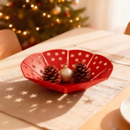 Stars Christmas bowl by DIZE Art Objects. A sculptural metal bowl featuring delicate lasercut snowflake motifs, designed to bring subtle festive charm to your space. The “Christmas Bowl – Snowflakes” blends minimal elegance with holiday warmth, making it an ideal decorative accent for tables, consoles, or centerpieces. A refined seasonal touch by DIZE Art Objects.