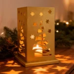 Christmas Tree Lantern | DIZE Art Objects A festive metal lantern featuring a stylized Christmas tree and star cut-outs that cast a warm, decorative glow when lit. Designed to hold candles safely inside, the Christmas Tree Lantern brings cozy ambiance and elegant holiday charm to any interior. A refined seasonal piece by DIZE Art Objects.